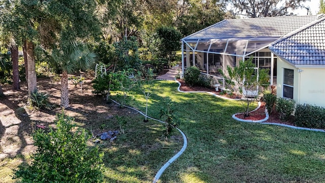 view of yard featuring a lanai