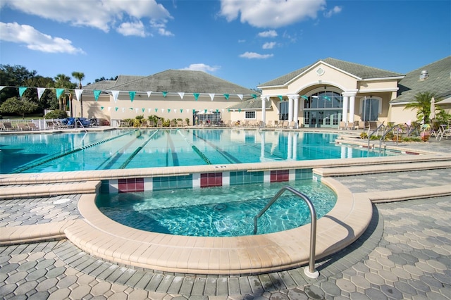 view of pool featuring a patio