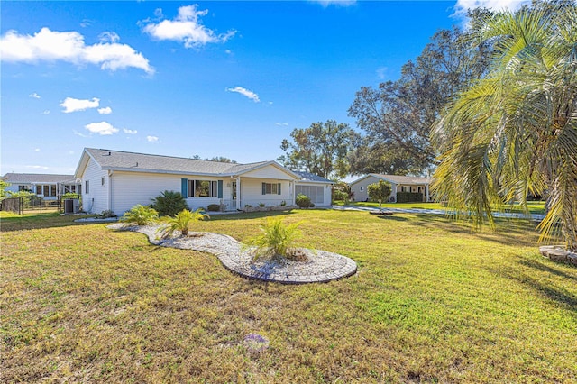 view of front of property featuring cooling unit and a front lawn