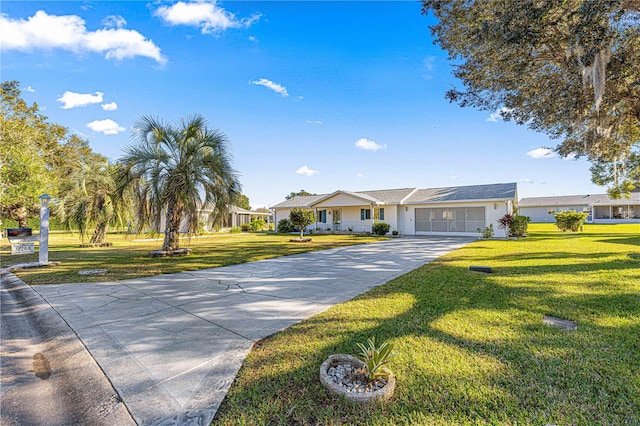 single story home with a front yard