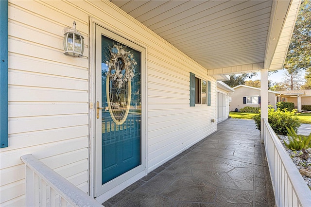 entrance to property with a porch