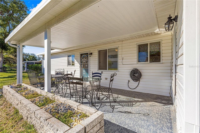 view of patio featuring covered porch