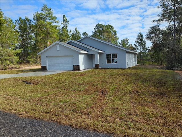 single story home with a front yard and a garage