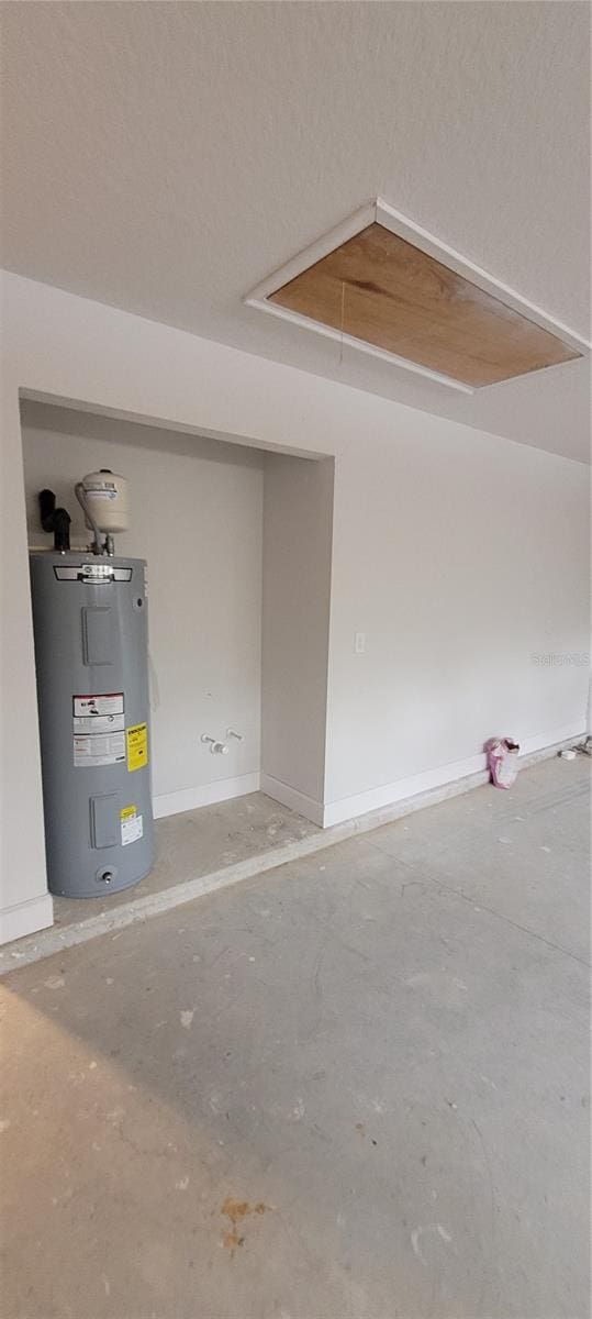 garage featuring water heater