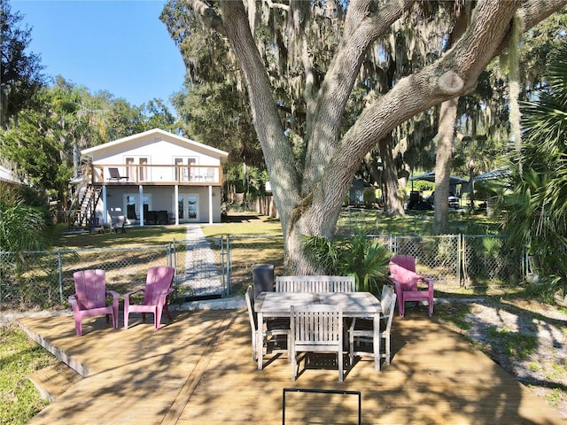 view of patio with a balcony and a deck