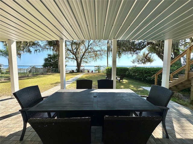 view of patio / terrace with a water view