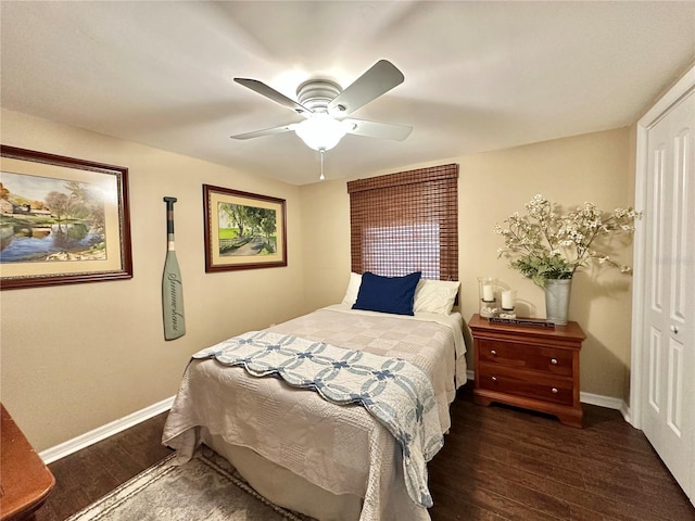 bedroom featuring a closet, ceiling fan, and dark wood-type flooring