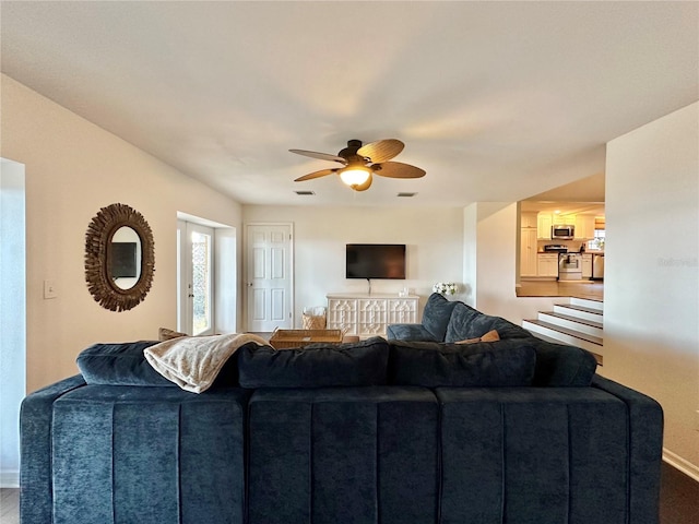 living room with ceiling fan