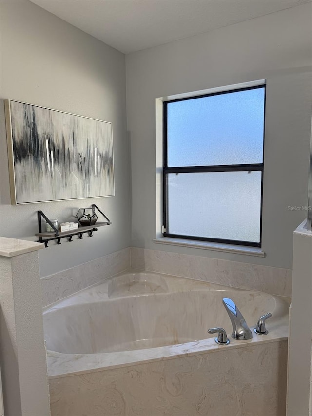 bathroom with a bathing tub