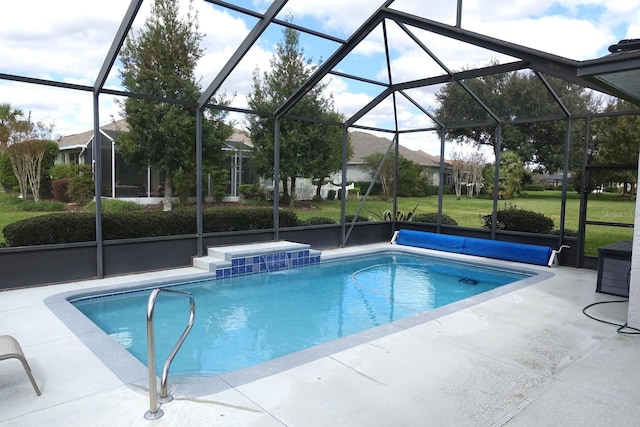 view of pool featuring a patio and a lanai