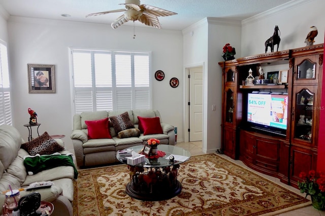 living room with a textured ceiling, ceiling fan, crown molding, and light tile patterned flooring