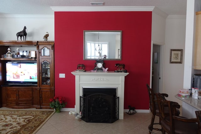 living room with crown molding and light tile patterned flooring