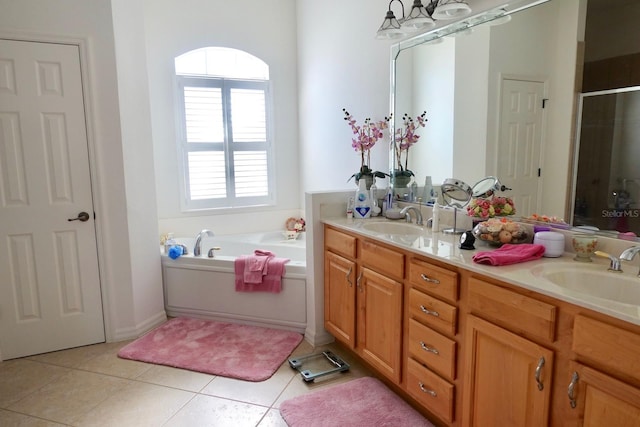 bathroom featuring vanity, tile patterned floors, and independent shower and bath