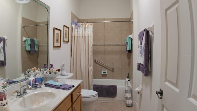 full bathroom featuring toilet, shower / bath combo, vanity, and tile patterned floors