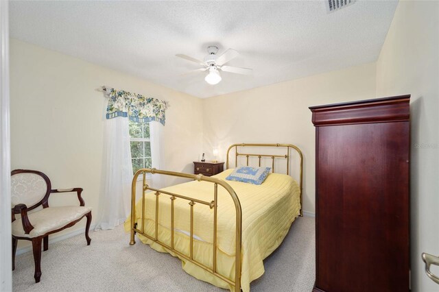 5336 SW 109th Place Rd, Ocala, FL 34476 - bedroom featuring carpet floors and a ceiling fan