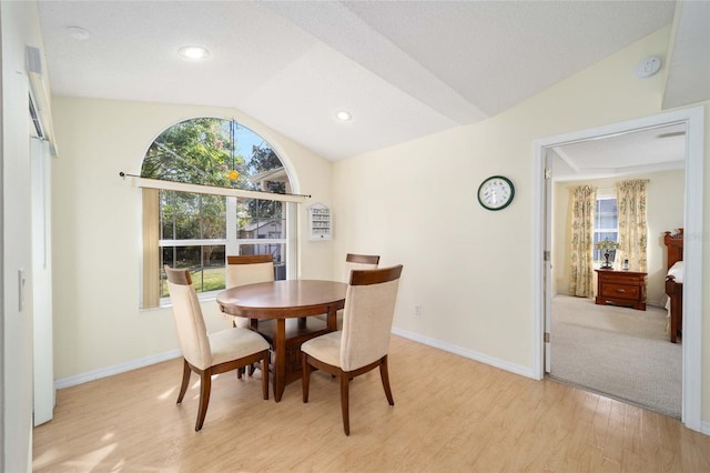 5336 SW 109th Place Rd, Ocala, FL 34476 - dining room featuring vaulted ceiling, light wood-style flooring, baseboards, and recessed lighting