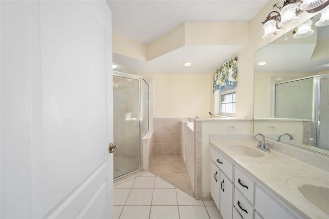 5336 SW 109th Place Rd, Ocala, FL 34476 - bathroom featuring a stall shower, double vanity, tile patterned floors, and a bath