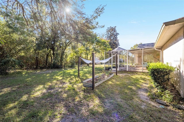 view of yard with a lanai