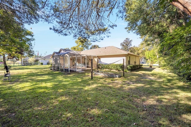 5336 SW 109th Place Rd, Ocala, FL 34476 - view of grassy yard with a lanai