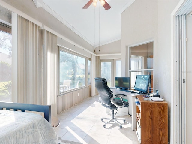 office with a wealth of natural light, light tile patterned floors, and vaulted ceiling