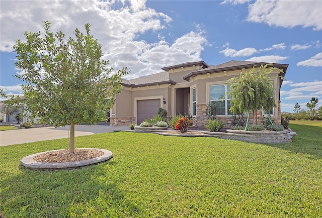 prairie-style house with a front yard and a garage