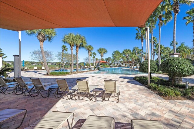 view of patio featuring a community pool