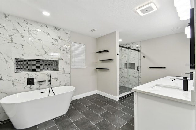 bathroom featuring tile patterned floors, vanity, and independent shower and bath