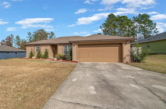 view of front of house featuring a front lawn and a garage