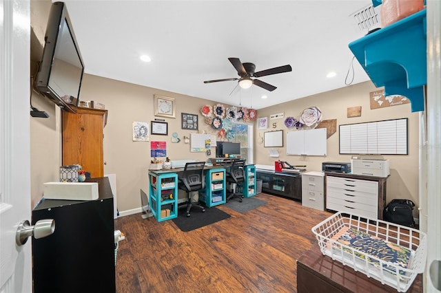 office space featuring dark hardwood / wood-style floors and ceiling fan