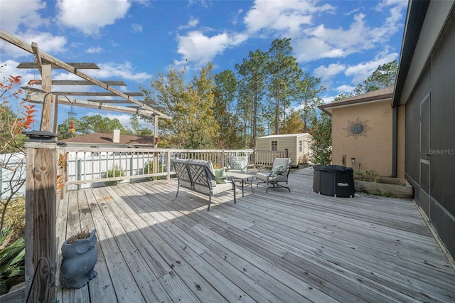 wooden terrace with a pergola