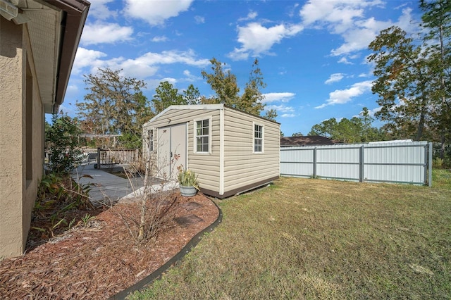 view of outdoor structure featuring a yard