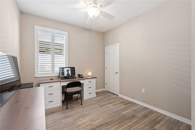 office area with light wood-type flooring and ceiling fan