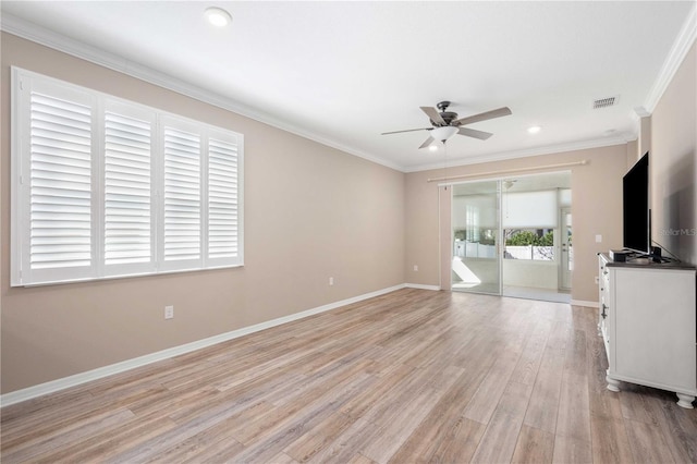 unfurnished living room featuring light hardwood / wood-style floors, ceiling fan, and ornamental molding