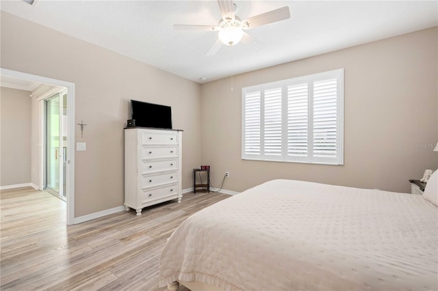 bedroom with ceiling fan, access to outside, and light hardwood / wood-style flooring