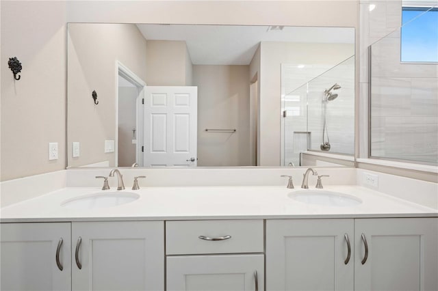 bathroom with vanity and an enclosed shower