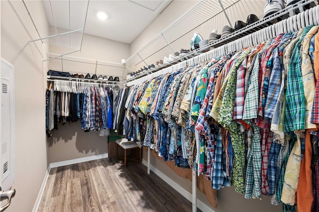 walk in closet featuring hardwood / wood-style floors