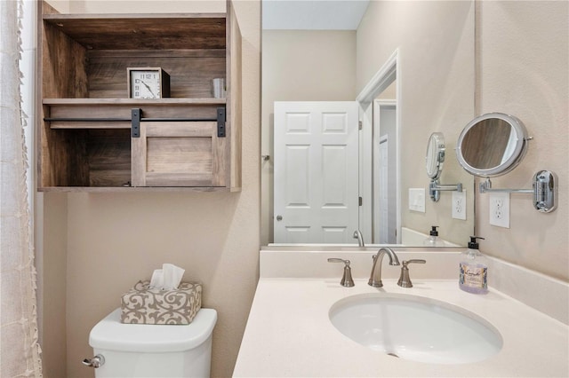 bathroom featuring sink and toilet