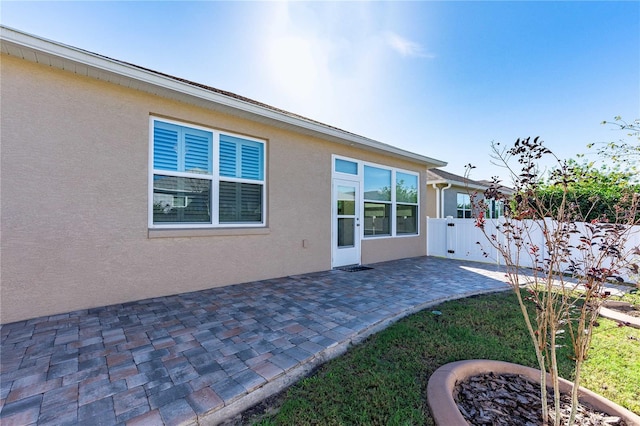 rear view of house featuring a patio area