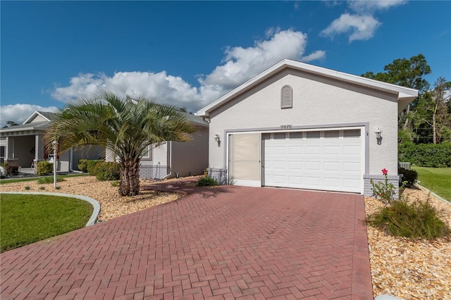 single story home with a garage