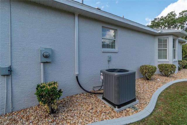 view of home's exterior with central air condition unit