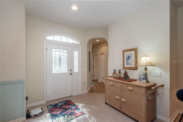 foyer entrance featuring light tile patterned floors