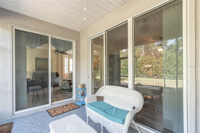 sunroom with wooden ceiling