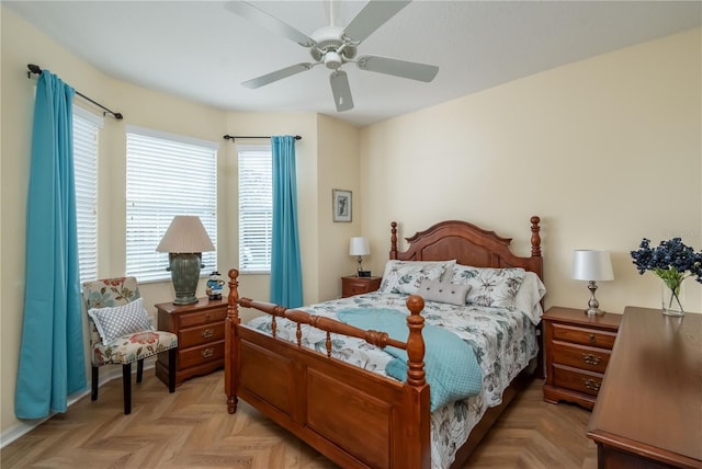 bedroom featuring ceiling fan and light parquet flooring