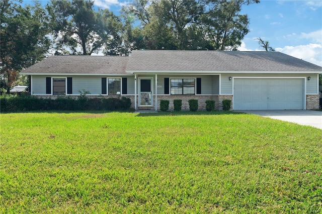 ranch-style house with a garage and a front yard