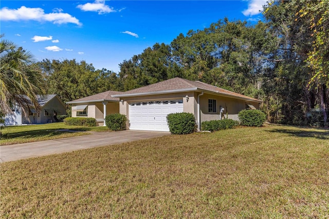 ranch-style house with a garage and a front lawn