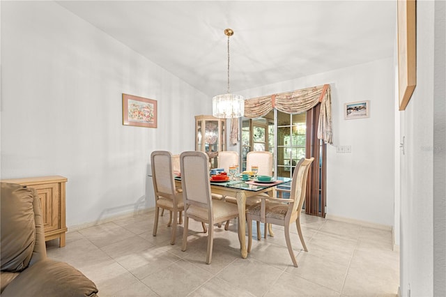 dining space featuring a chandelier and light tile patterned floors