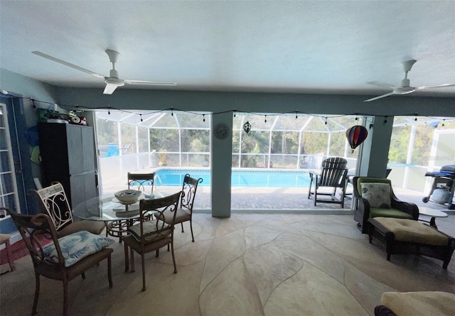 interior space featuring a grill and ceiling fan