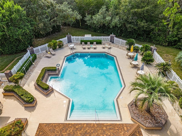 view of pool featuring a patio