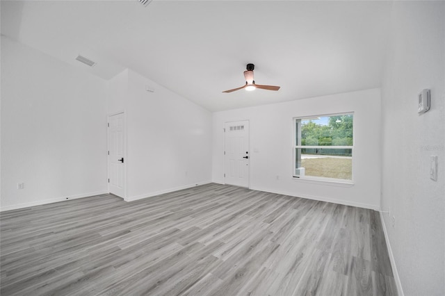 unfurnished room with ceiling fan and light hardwood / wood-style floors