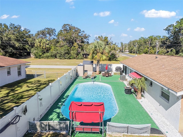 view of swimming pool featuring cooling unit